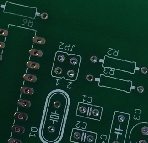 Seems I had to rotate JP2 90 degrees in the schematic and PCB design, bugger